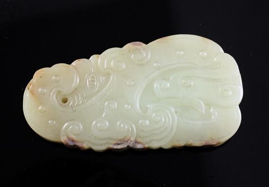 A Chinese archaistic yellow and russet jade pendant plaque, 5.2cm